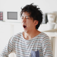 Image for article titled Tired Man Can’t Deal With Chipper Frosted Mini Wheats Box So Early In The Morning